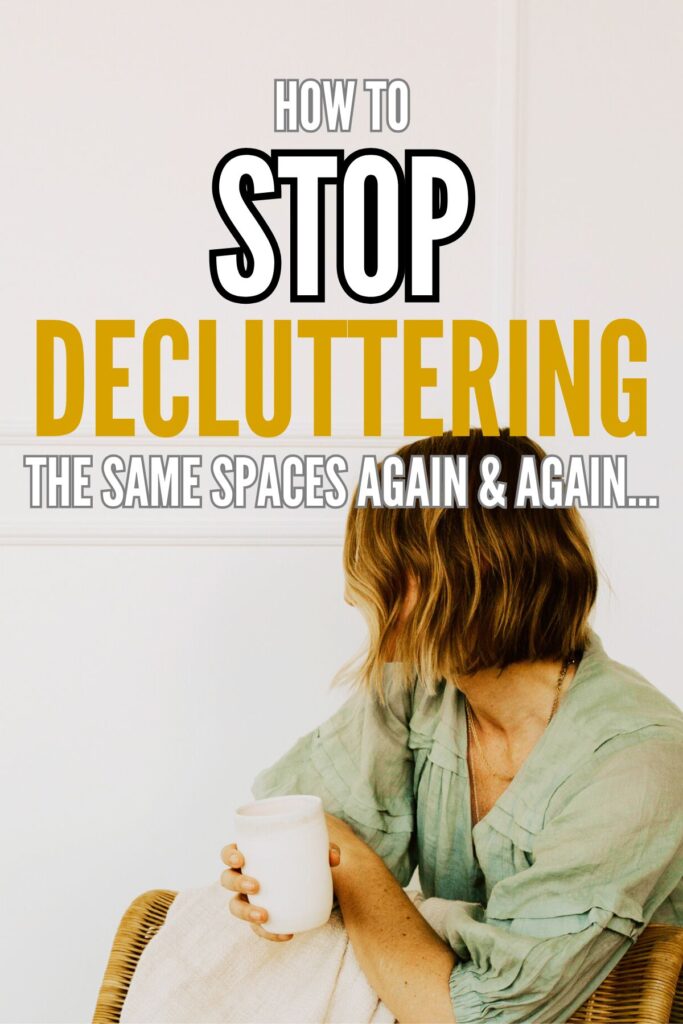 Lady sitting with a cup in her hands, looking at her blank wall in the house like she's thinking about something