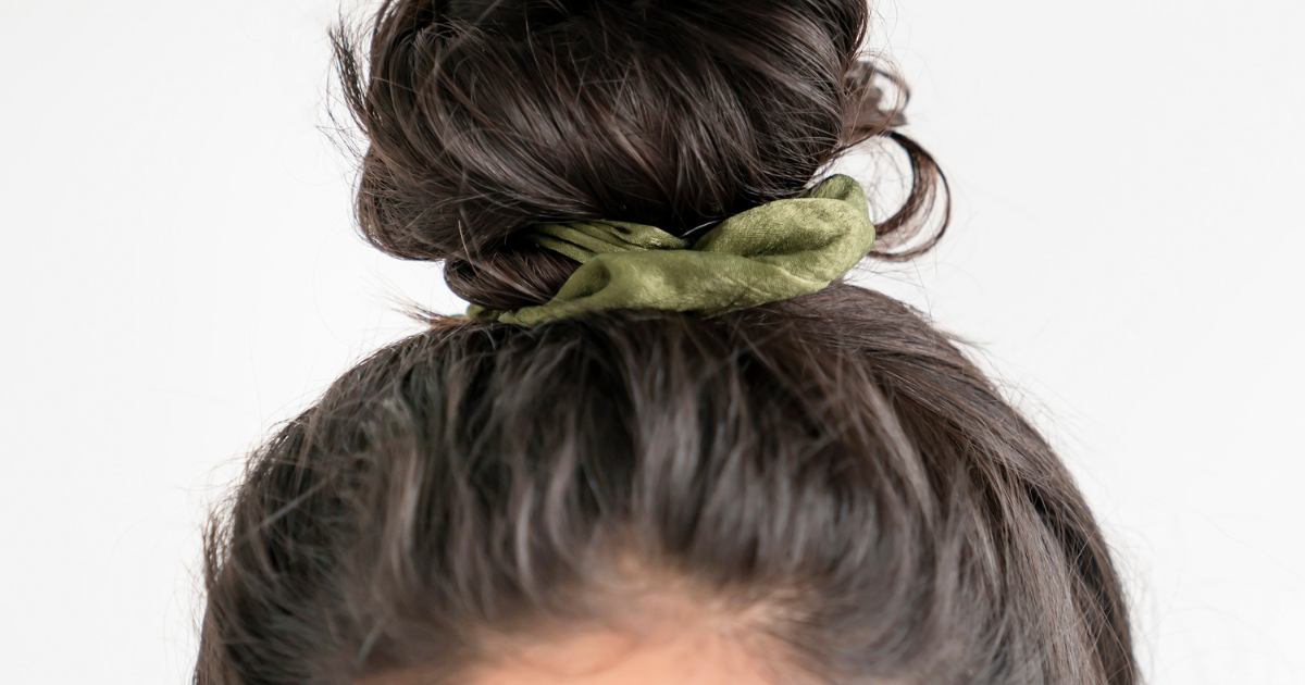 Feel Good Home Pic - Top of Ladys head with a bun