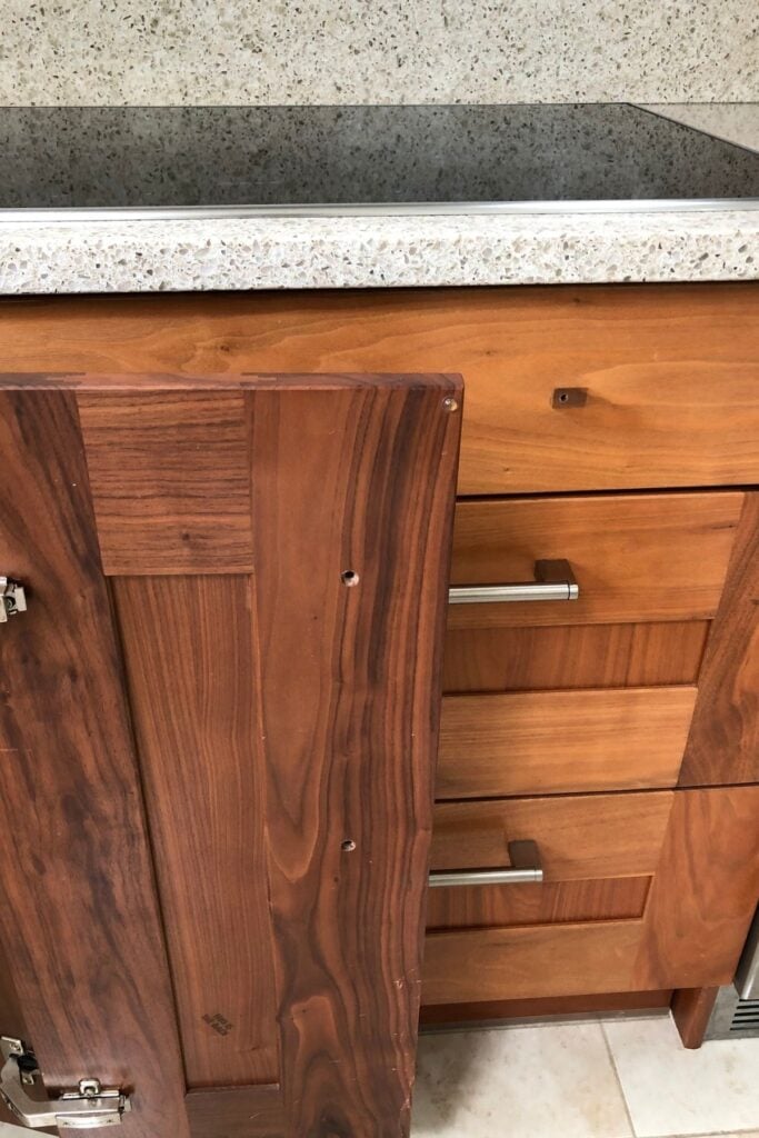 Walnut wood kitchen having faded over time