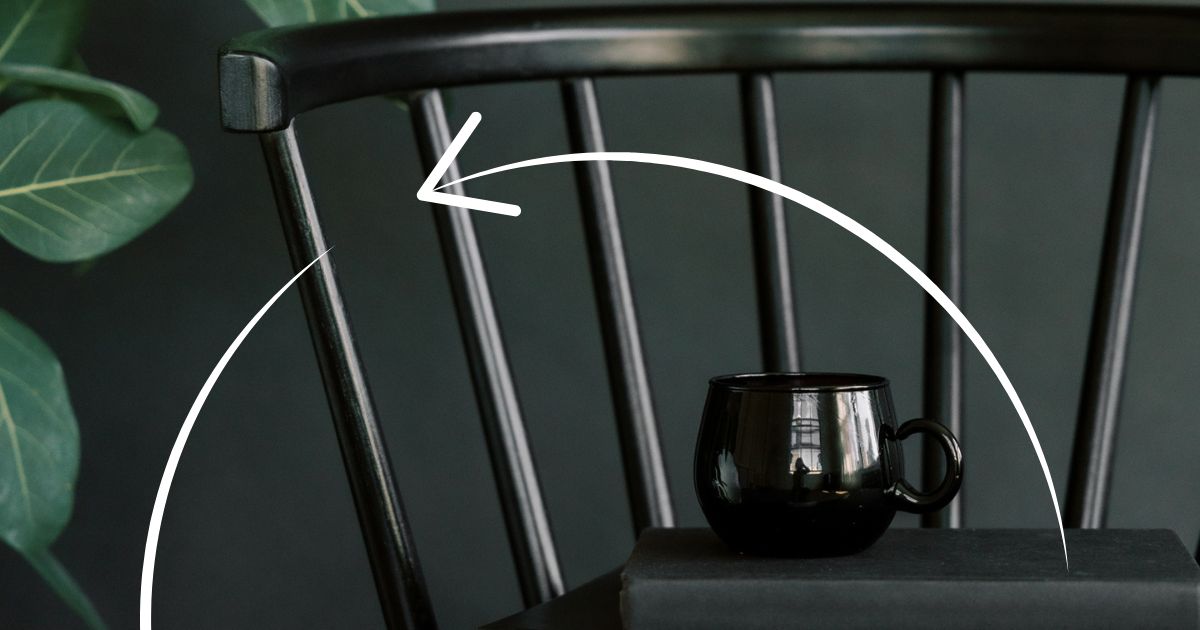 Black chair with black mug on it, with a black wall behind - and a white circular arrow over the top signifying movement like the journey of stuff that's talked about in the article