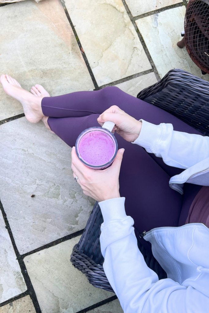 3 Simple Habits To Make Mornings Easier Every Day 10 Sitting outside on the patio with my leggings on ready for my morning workout, enjoying my smoothie first