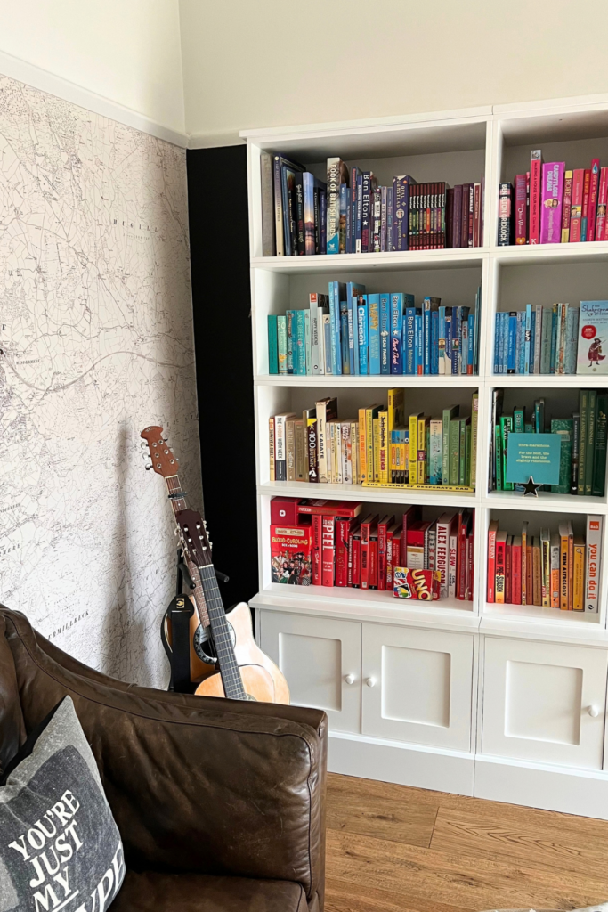 5 Ways To Sort Your Books Out (& Which Is Your Best Choice) 2 colour coded bookcase